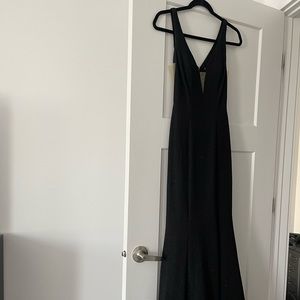 Brand new never worn black classy formal dress.